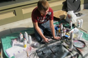 Trevor Aycox Painting outside the Good Purpose Gallery