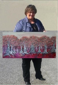 Nekea with one of her smashed glass paintings Red Riding Hood